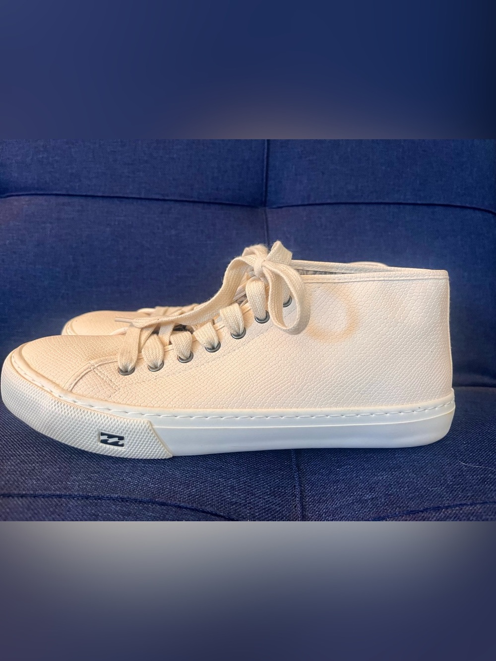 Billabong "Who's That Girl" mid-top sneaker.